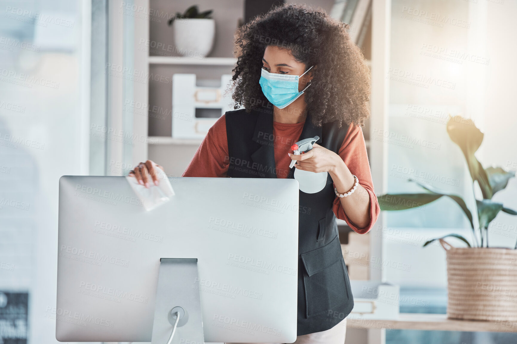 Buy stock photo Woman, covid and spray for cleaning computer with face mask, workplace safety and liquid for healthcare. Professional cleaner, desktop pc and clean to stop virus in office with bacteria risk at job