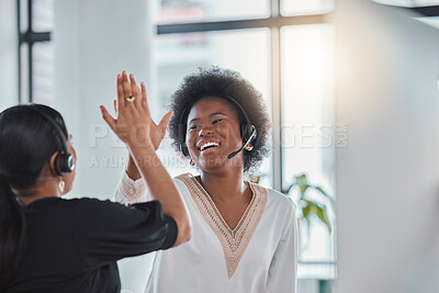 Buy stock photo Employees, customer service and woman in office, high five and celebration for target, success and motivation. Female consultants, agents and friends with gesture for achievement, goal and support