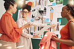 Women, sketch or fashion meeting for planning clothing, fabrics or boutique clothes with teamwork together. Happy creative designers talking, speaking or working on group ideas or strategy in office