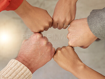 Buy stock photo Teamwork, top view or fist of business people in circle for motivation, corporate community or hope together. Collaboration, diversity or hands of employees meeting for our vision, strategy or goals