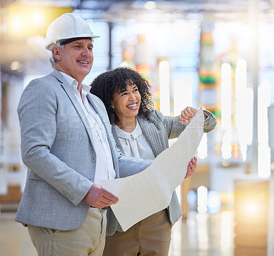 Buy stock photo Man, woman and smile for construction, blueprint development and planning building design. Happy team, diversity and engineering collaboration for project management, infrastructure and architecture