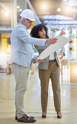 Buy stock photo Man, woman and construction team brainstorming at building site with blueprint, ideas or design. Diversity, project management and architect pointing to infrastructure, engineering and floor planning