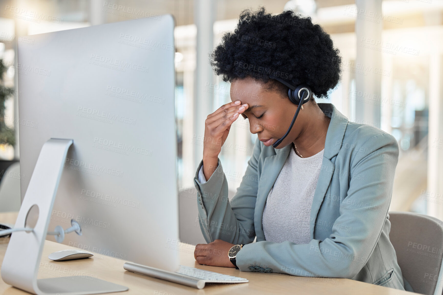 Buy stock photo Call center, telemarketing and black woman with headache, stress and burnout in workplace. Female employee, consultant and agent with migraine, depression and tech support in office and frustrated