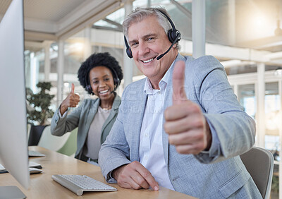 Buy stock photo Customer support, thumbs up and portrait of call center employees happy at computer in consulting office. Help desk, smile and mature man with black woman at advisory agency for crm networking online