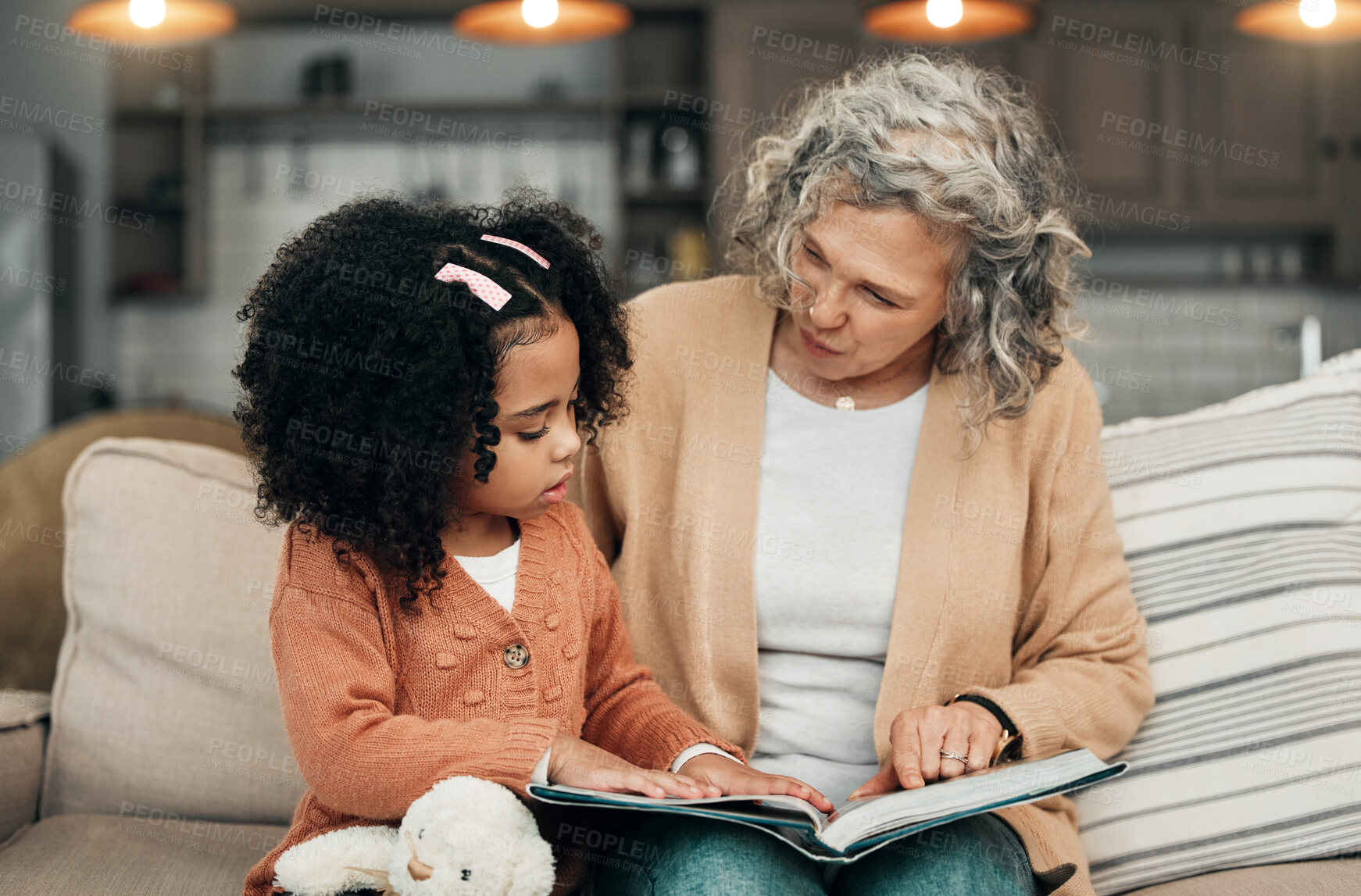 Buy stock photo Family kid, book and grandmother reading fantasy storybook, story or bonding on home living room sofa. Love, grandma babysitting and senior woman with child development for adoption kindergarten girl