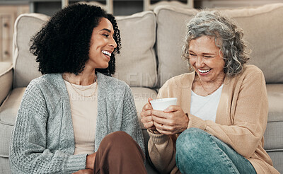 Buy stock photo Love, mother and adult daughter on floor, coffee and conversation with happiness, break and laughing. Family, mama and female grown child on ground, tea and smile with rest, funny and quality time