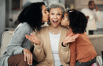 Buy stock photo Portrait, surprise or love with a daughter and granddaughter kissing a senior woman on the cheek in a home. Mothers day, wow or children with a girl and mother giving a kiss to a grandmother