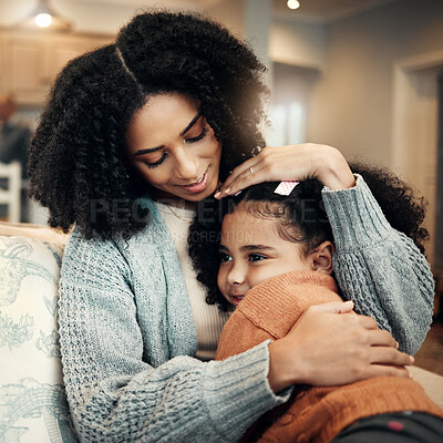 Buy stock photo Family, love or kid hug mother for Mothers Day, home bonding or embrace on living room couch. Care, custody and biracial mom, mama or woman with female youth child, girl or daughter on apartment sofa
