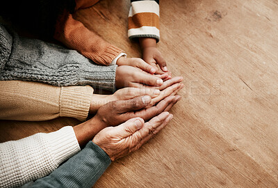 Buy stock photo People, hands together and generations in care above on mockup for unity, compassion or trust on wooden table. Group holding hand for support collaboration, love or community in teamwork solidarity