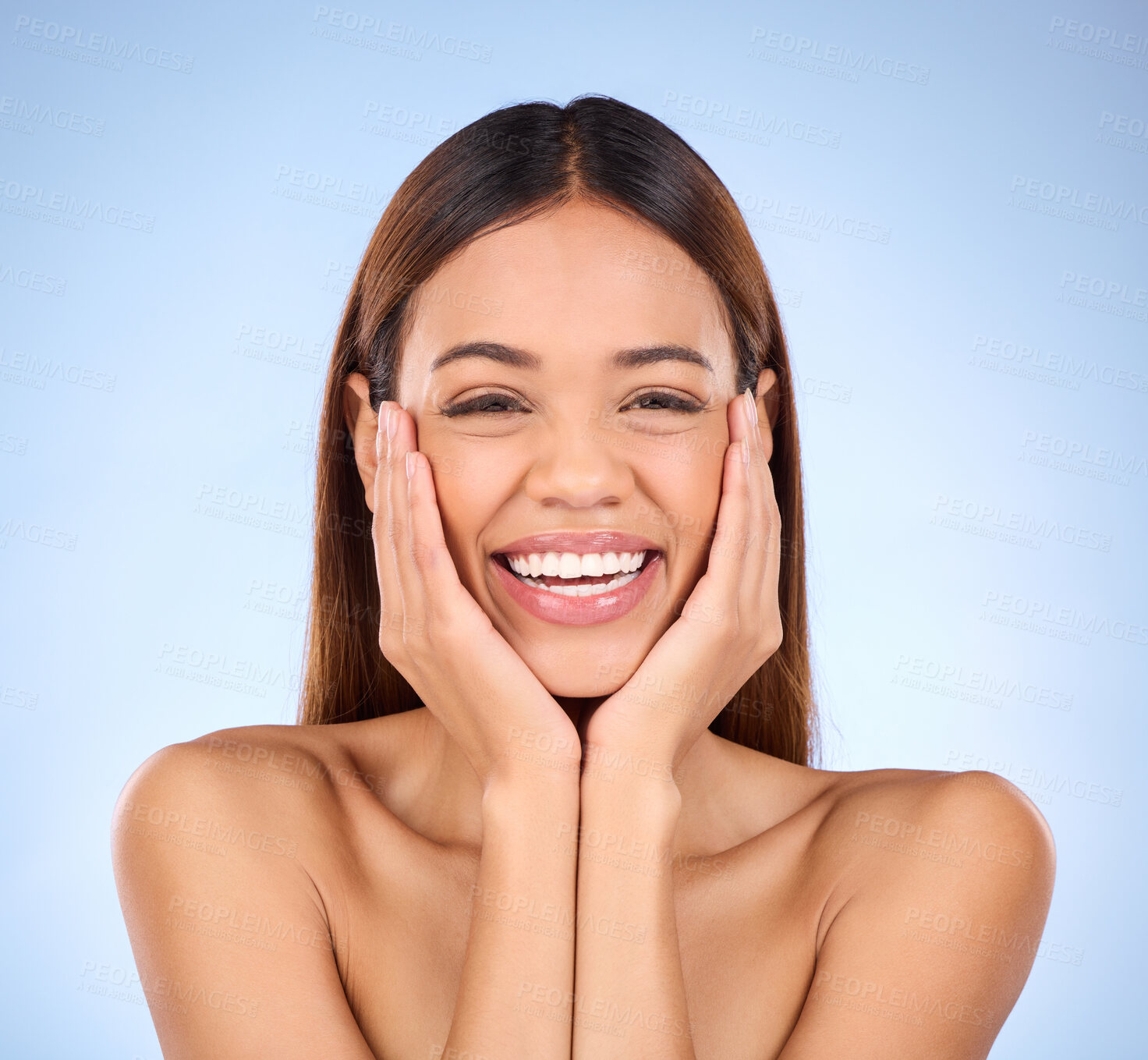 Buy stock photo Skincare, hands on face and portrait of woman laughing in studio for skin care promo on blue background. Makeup, facial cosmetics and smile, hispanic beauty model in Mexico for dermatology promotion.