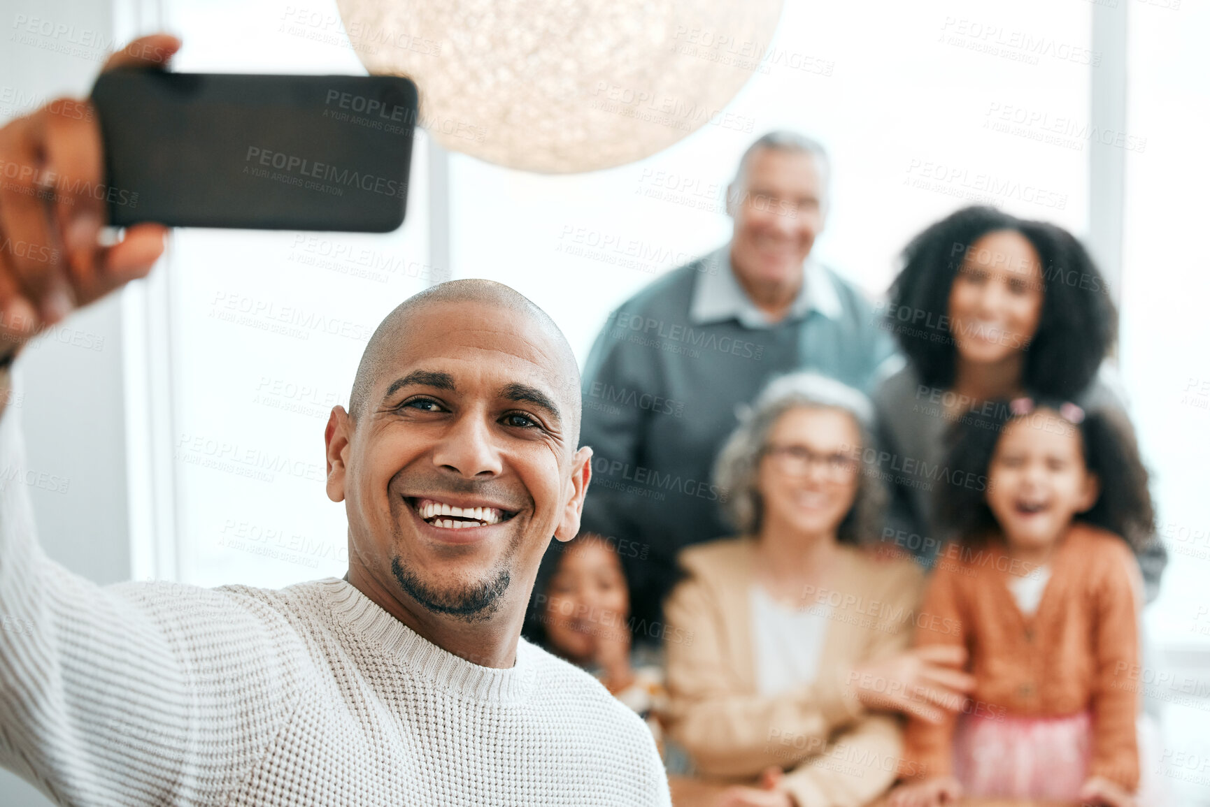 Buy stock photo Group, happy and a man with family for a selfie, memory and photo together. Smile, bonding and a guy taking a picture on a phone with parents and children for quality time during a home visit