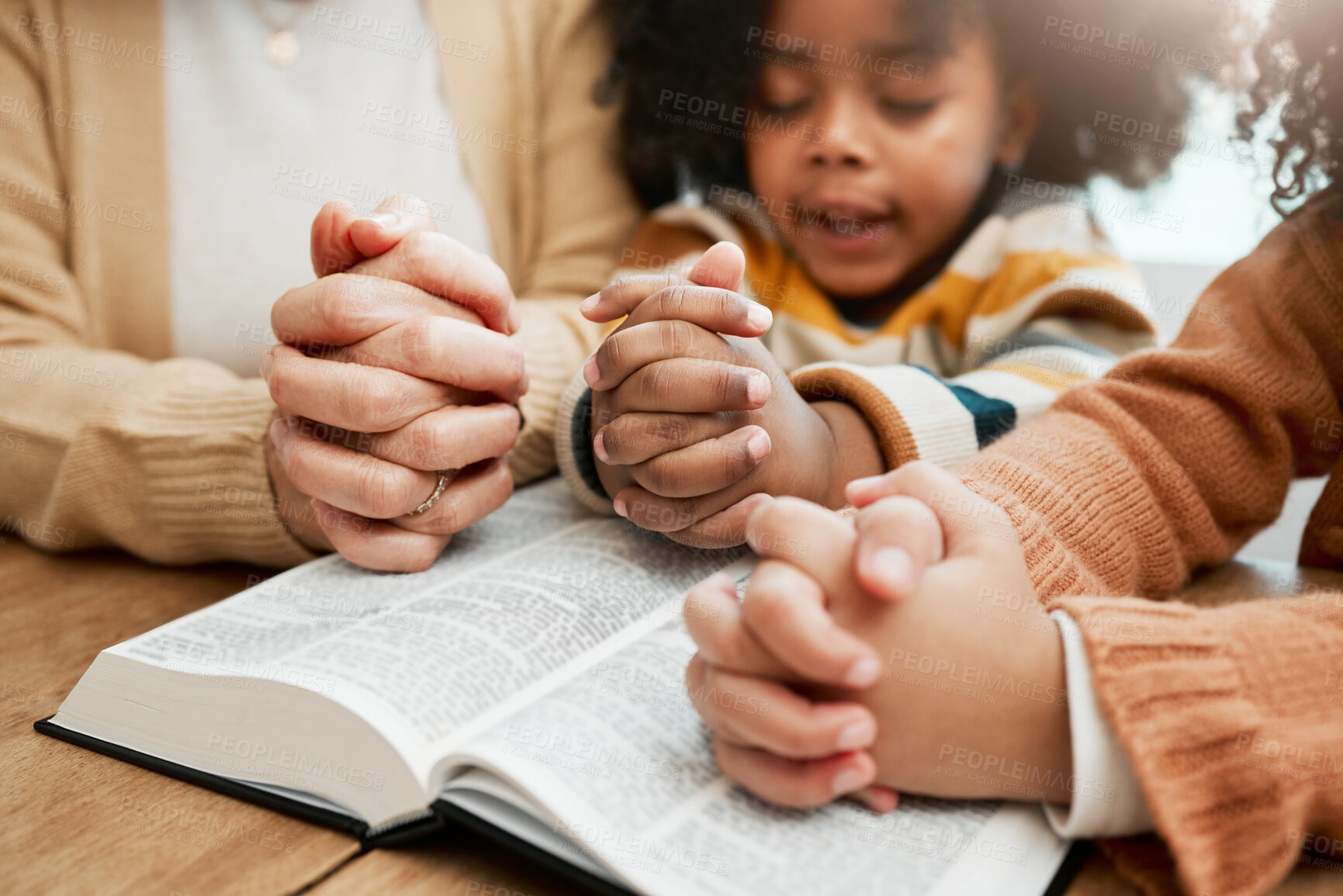 Buy stock photo Bible, hands or mom praying with children siblings for prayer, support or hope together in Christianity. Kids education, family worship or woman studying, reading book or learning God in religion