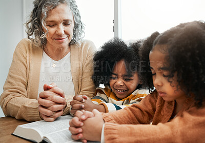 Buy stock photo Bible, prayer or grandmother praying with kids or siblings for worship, support or hope in Christianity. Children education, family or old woman studying, reading book or learning God in religion