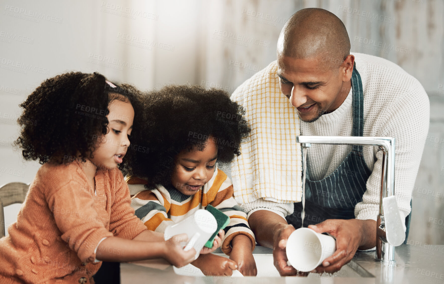 Buy stock photo Happy, cleaning and father with children in kitchen for bonding, hygiene or teaching. Smile, support and chores with black family washing dishes at home for sanitary, responsibility or housekeeping