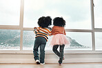 Window, looking and back of children with view of ocean, mountain and nature landscape from home. Childhood, relax and kids by glass waiting to play outdoors by sea on holiday, vacation and weekend