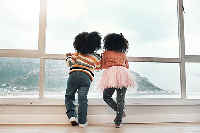 Buy stock photo Window, looking and back of children with view of ocean, mountain and nature landscape from home. Childhood, relax and kids by glass waiting to play outdoors by sea on holiday, vacation and weekend