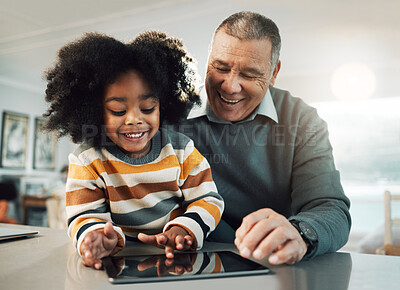 Buy stock photo Tablet, online education and child with grandfather bonding, fun internet games and e learning development. Biracial, elderly man with kid on digital technology app for family support and teaching