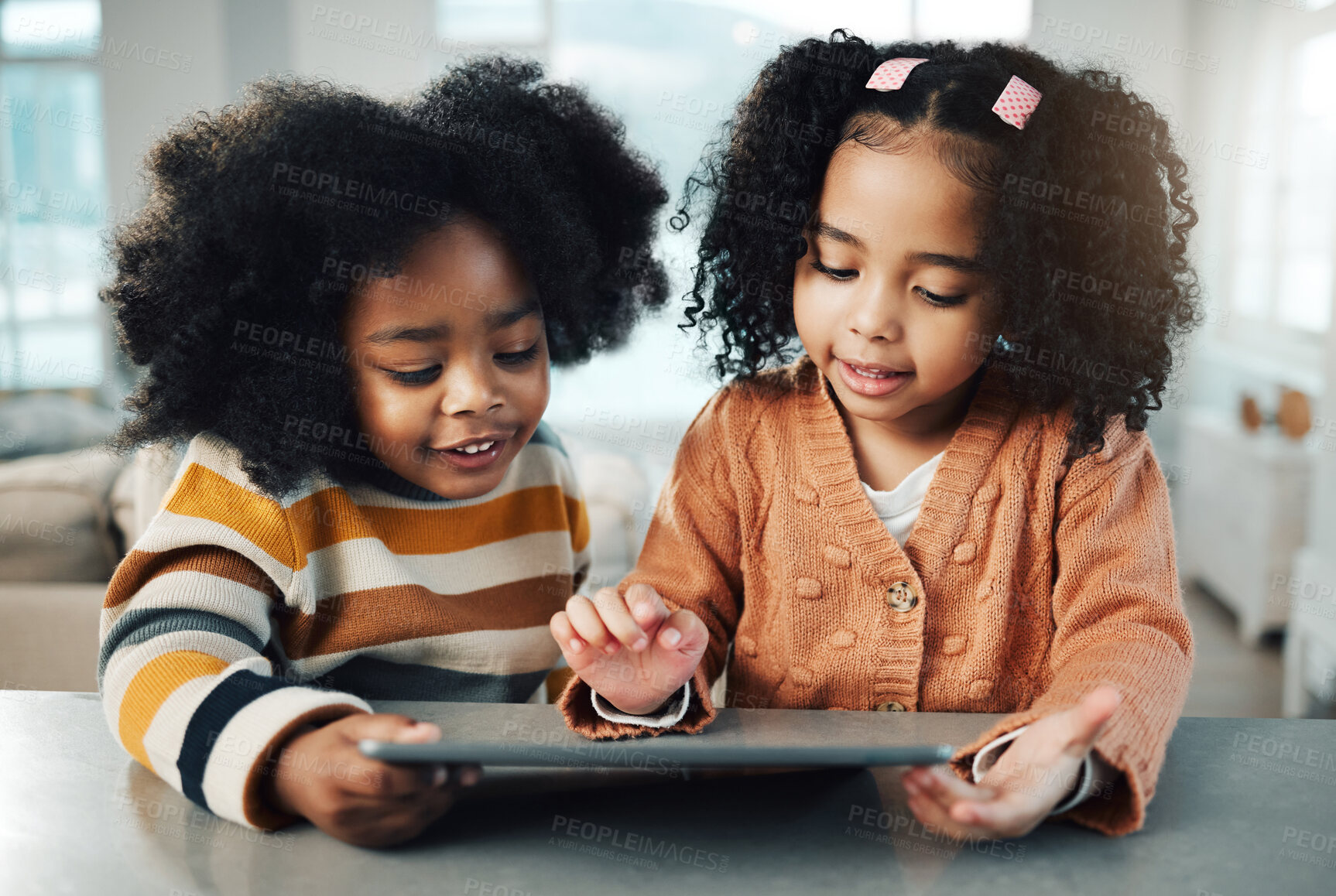 Buy stock photo Home, tablet and happy children in online education, fun games and watching internet cartoon or video together. Biracial family kids, siblings or friends on digital technology, app or movie streaming