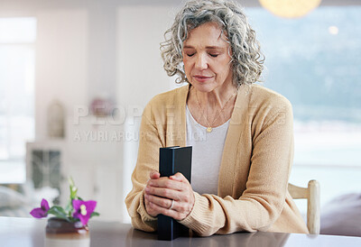 Buy stock photo Praying, senior woman and holy book for religion, faith and god help, support and spiritual healing at home. Prayer, gratitude and christian or elderly person with bible for hope, trust and worship