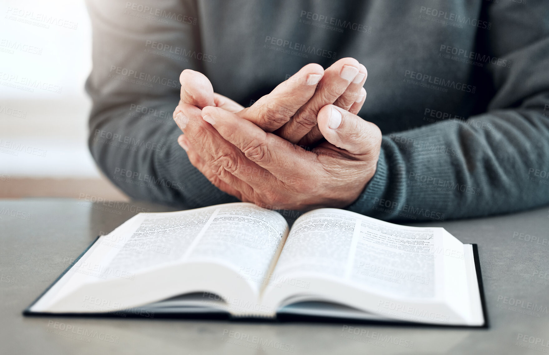 Buy stock photo Bible, reading book or old man praying for hope, help or support in Christianity religion or holy faith. Believe, prayer or senior person studying or worshipping God in spiritual literature at home