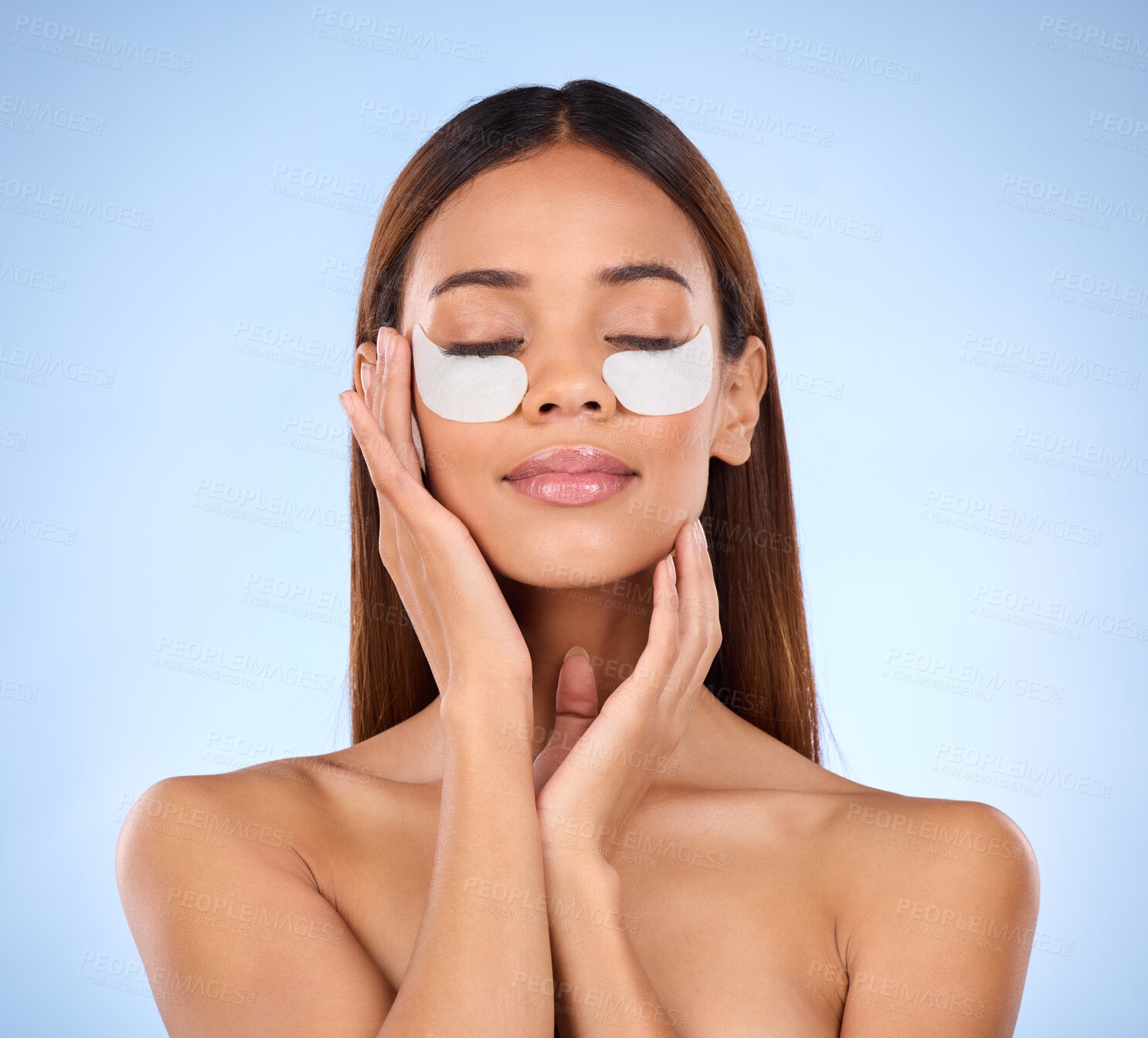 Buy stock photo Skincare, beauty and woman with collagen eye mask for anti aging skin glow on blue background. Cosmetics, facial repair pads and face of model with product and in studio for wrinkle treatment.