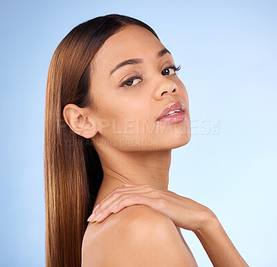 Buy stock photo Skincare, haircare and portrait of woman with shine in hair or skin after cosmetic treatment isolated in studio blue background. Soft, natural and clean female model due to dermatology and self care