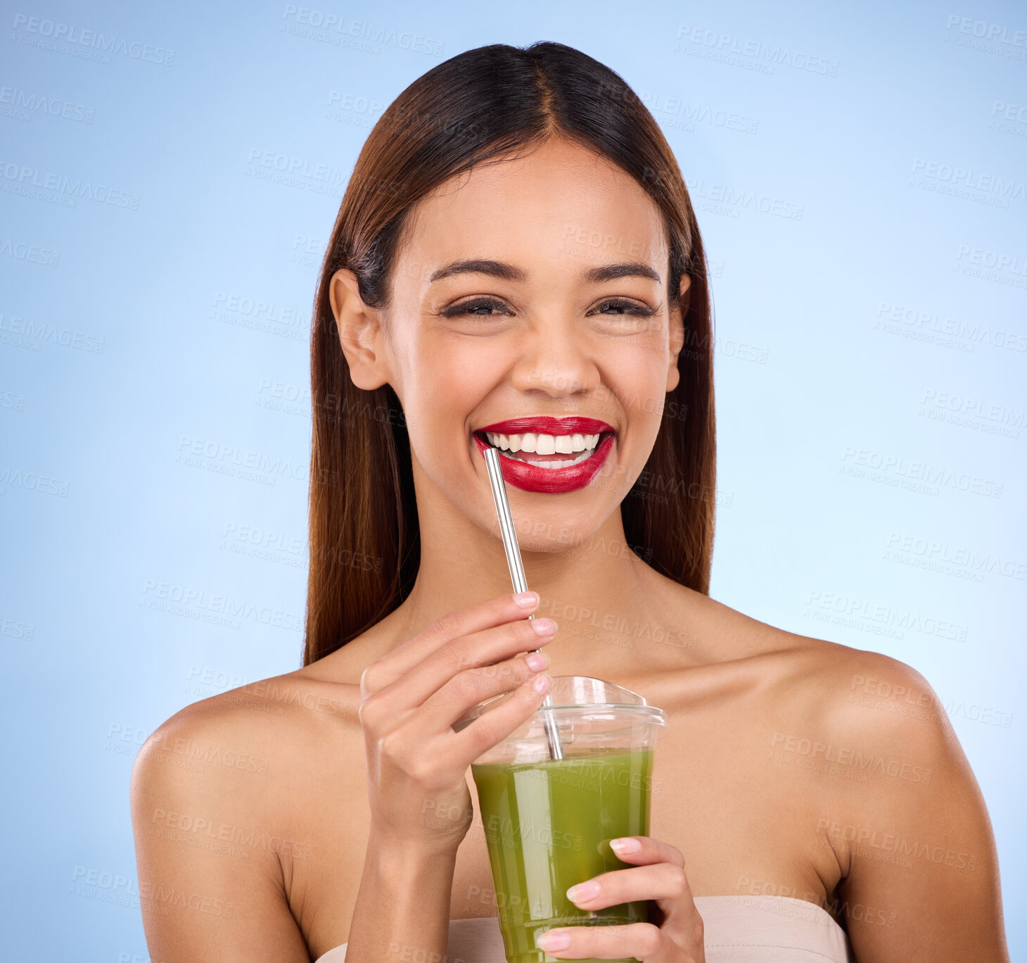 Buy stock photo Beauty, smoothie and health with portrait of woman in studio for detox, nutrition and diet, Happy, smile and minerals with girl model and green juice on blue background for vegan, fiber and protein