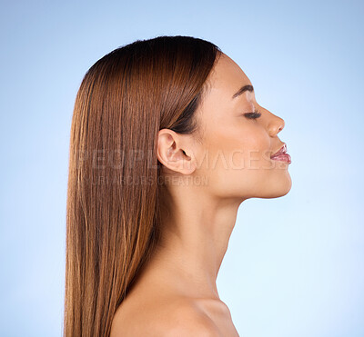 Buy stock photo Skincare, cosmetics and profile of woman in studio with skin promo on blue background. Makeup, facial and face of beauty model from Brazil for dermatology or haircare promotion and mockup.
