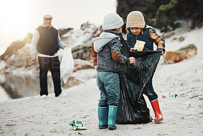 Buy stock photo Environment, plastic bags and children on beach, recycle and cleaning on earth day, reduce waste and helping. Friends, volunteers and kids with climate change project, sustainability or pick up trash