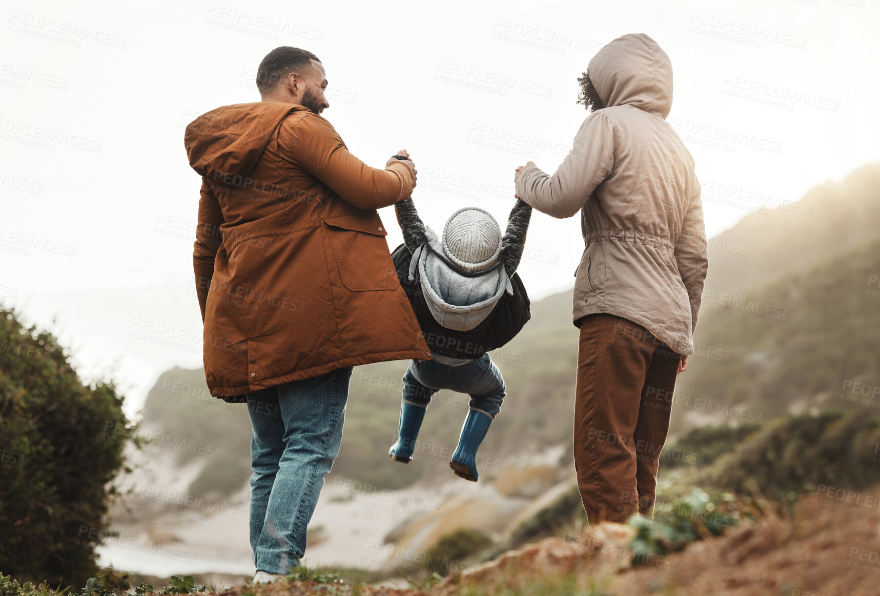 Buy stock photo Nature fitness, holding hands and hiking family of mother, father and child walking, play and bond on mountain adventure. Love, freedom peace or back view of winter people trekking on outdoor journey