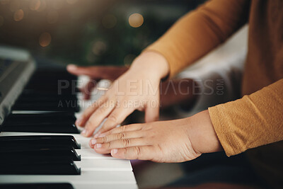 Buy stock photo Learning, piano and hands of a child and parent playing a song together. Education, music and zoom of a kid with a dad teaching an instrument during a musical lesson, help and showing to play