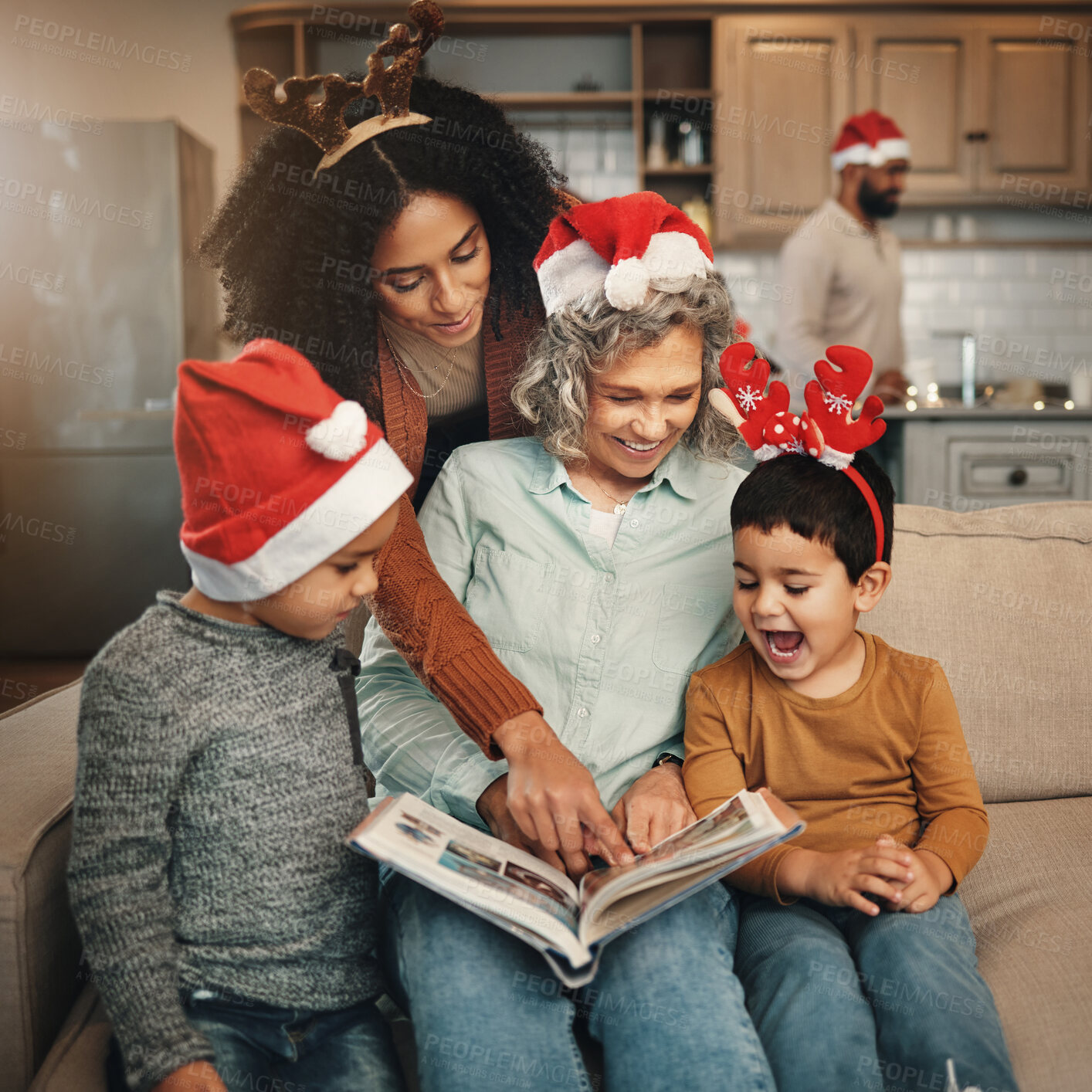 Buy stock photo Happy, christmas and family looking at a photo album for memories, nostalgia and bonding. Smile, festive and mother, grandmother and children excited to look at pictures of relatives in a book