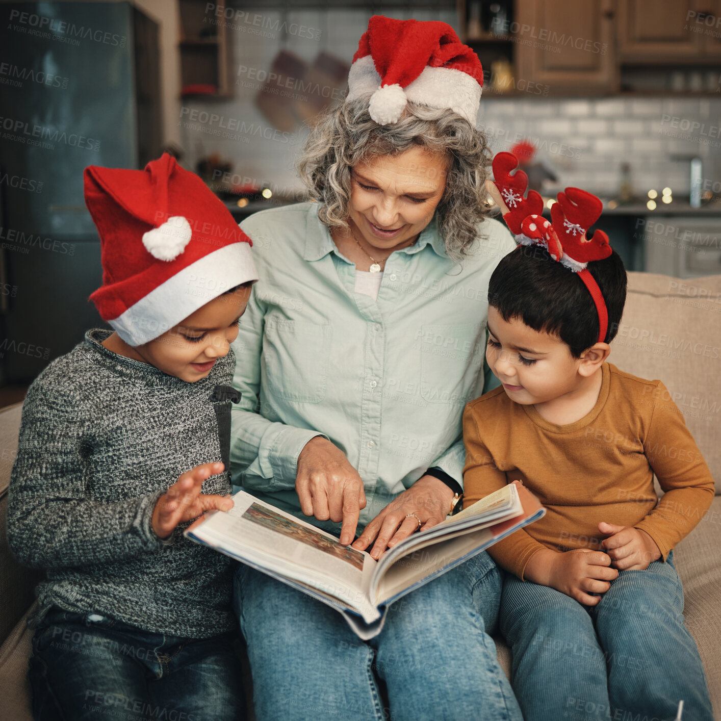 Buy stock photo Christmas, books or reading with a grandmother and kids looking at photographs during festive season. Family, love or celebration with a senior woman and grandchildren holding a story book