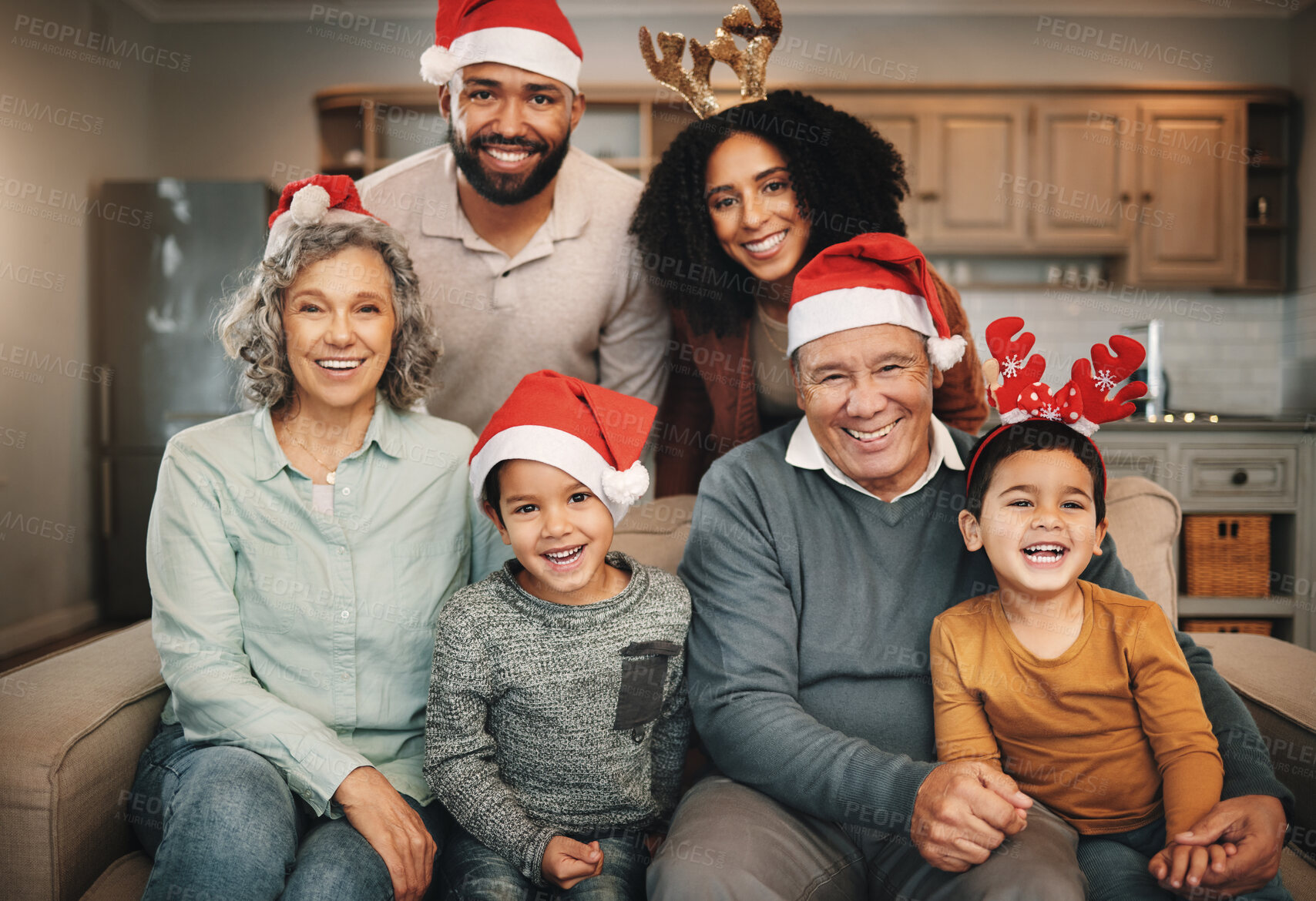 Buy stock photo Christmas, big family and portrait smile on sofa in living room  in home, bonding and care. Xmas, laughing and happy grandmother, grandfather and parents with boys or children enjoying holiday time.