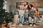 Christmas, portrait and family in lounge, quality time and happiness for bonding, loving and cheerful. Face, grandparents and mother with father, siblings or children with joy, Xmas or festive season