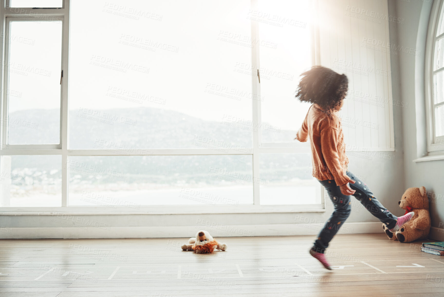 Buy stock photo Hopscotch, happy and girl play in home having fun, enjoying games and relaxing in bedroom. Childhood mockup, entertainment and girl with copy space  playing, jumping and balance for numbers activity