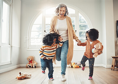 Buy stock photo Hopscotch, grandmother and children play in home having fun, enjoy games and balance together in bedroom. Happy family, entertainment and grandma with kids for jumping, playing and numbers activity