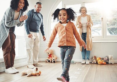 Buy stock photo Hopscotch, happy family and parents play with girl having fun, enjoying games and relax together. Childhood, entertainment and mom, dad and girl cheer for jumping game, balance and numbers activity