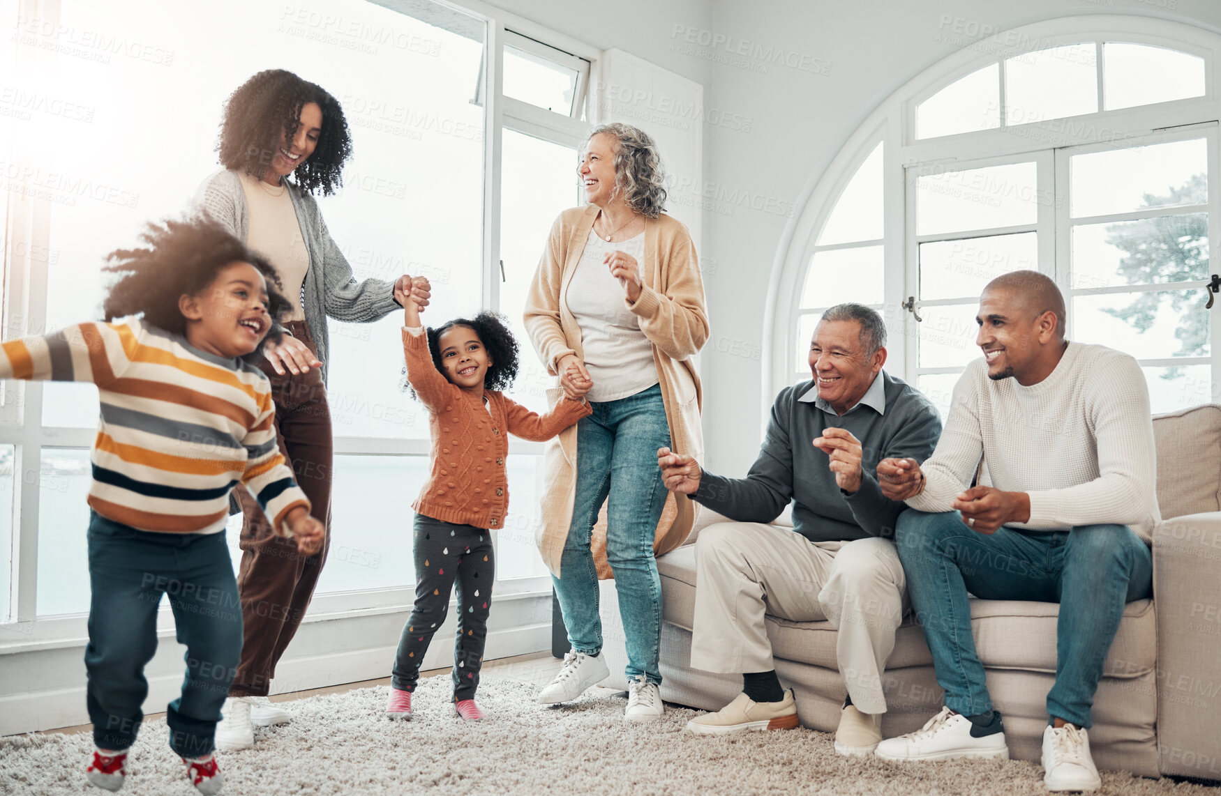 Buy stock photo Big family, children dancing and living room with parents, grandparents or love with holding hands in home. Girl kids, mom and dad with cheerful dance, smile or happiness in house together on holiday