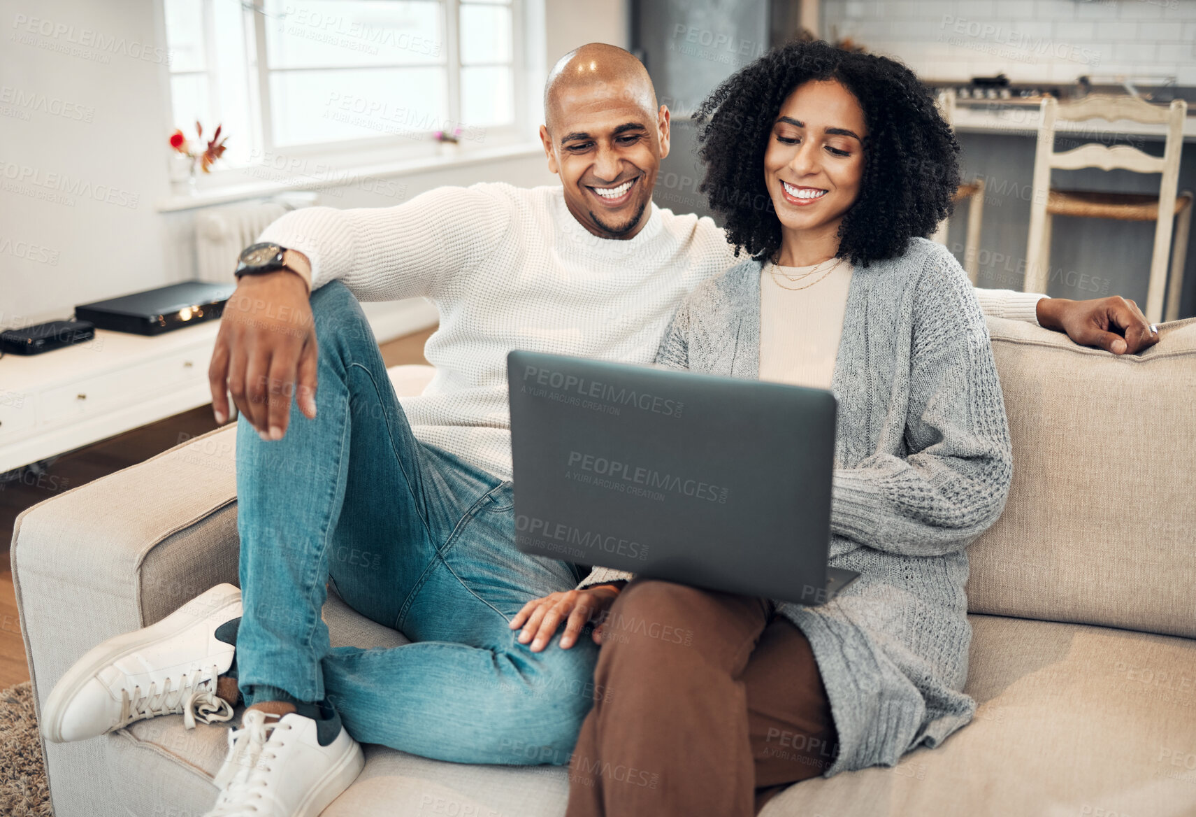 Buy stock photo Relax, happy and couple on a sofa with laptop in the living room of their modern house. Love, romantic and young man and woman browsing or scrolling on social media or internet with computer together