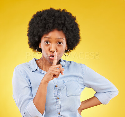 Buy stock photo Privacy, secret and finger on lips of black woman in studio for mystery, gossip and announcement. Noise, news and whisper with female and shush gesture on yellow background for rumor, drama or silent