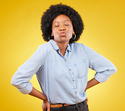 Buy stock photo Flirty, attitude and a black woman with a kiss for love isolated on a yellow background. Young, expression and an African girl showing affection, care and a fashionable look on a studio backdrop
