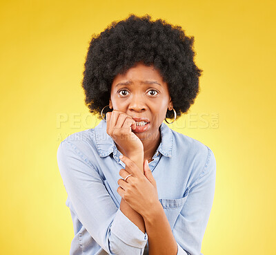 Buy stock photo Fear, anxiety and biting nails with portrait of black woman in studio for scared, worry and nervous. Terror, problem and mental health with female on yellow background for stress, confused and crisis