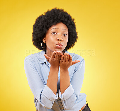 Buy stock photo Happy, blowing kiss and portrait of black woman in studio for confidence, flirting and romance. Self love, relax and desire with female on yellow background for positive, sensual and proud gesture