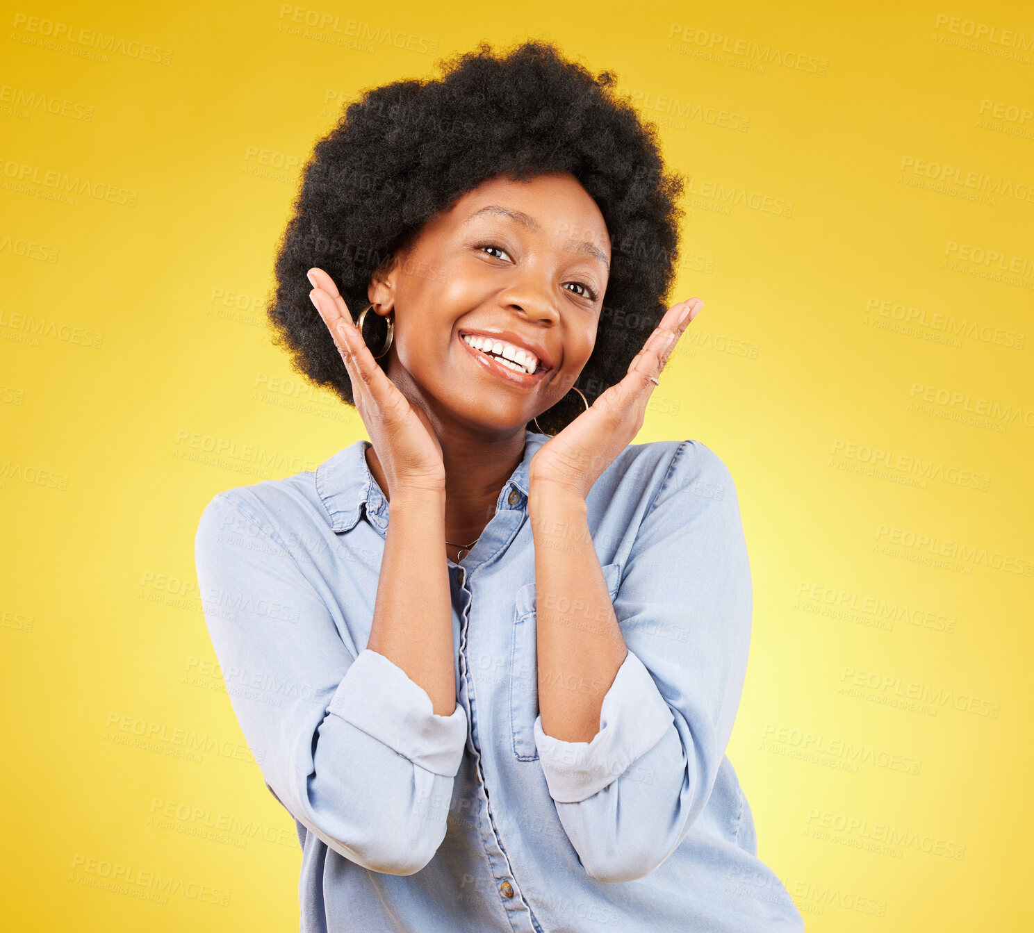 Buy stock photo Black woman, hands on face and smile portrait in studio while excited on yellow background. African female model with afro, beauty and happiness on color space with motivation and positive mindset
