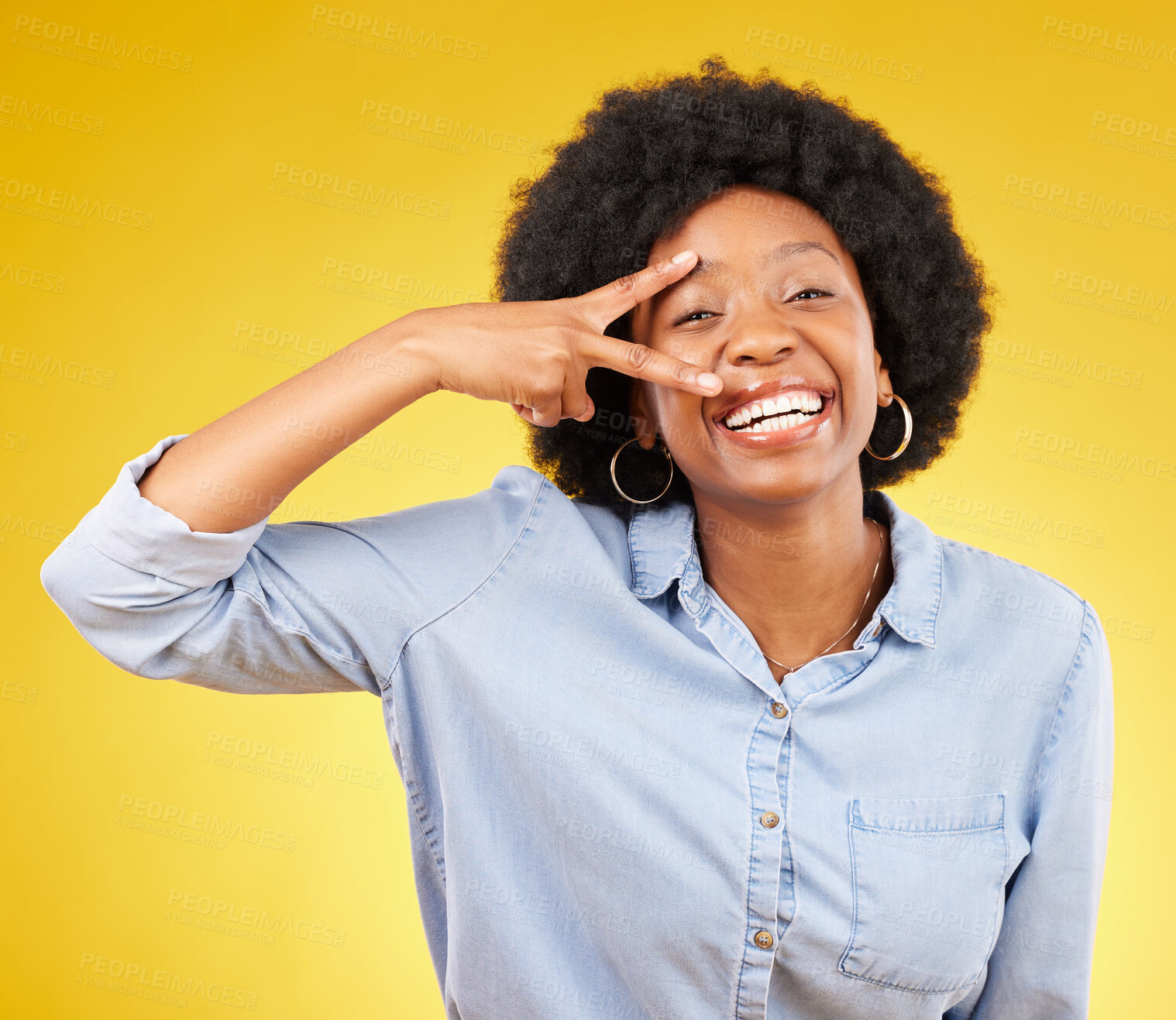 Buy stock photo Black woman, peace sign and smile portrait in studio while happy on yellow background. African female model with hand gesture or emoji while laughing on color with motivation and positive mindset
