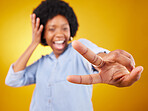 Happy, peace sign and hand of a black woman in studio with a positive and goofy mindset. African female model posing with finger gesture while happy about motivation or victory on yellow background