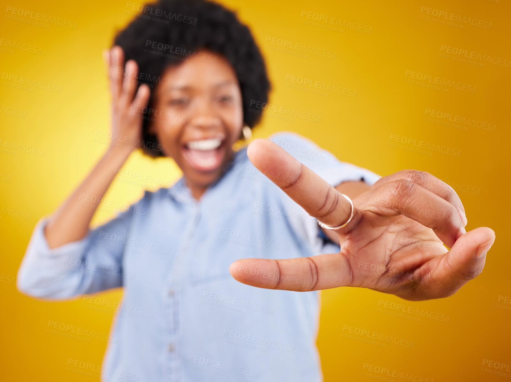 Buy stock photo Happy, peace sign and hand of a black woman in studio with a positive and goofy mindset. African female model posing with finger gesture while happy about motivation or victory on yellow background