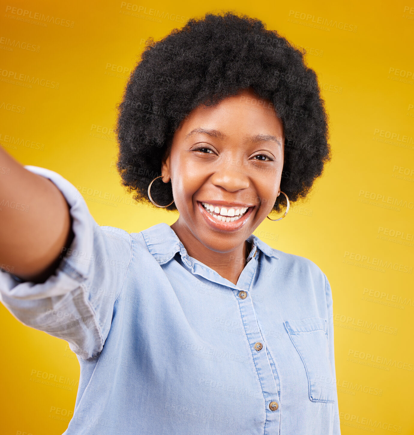 Buy stock photo Portrait, selfie and black woman in studio happy, smile and confident against yellow background. Face, social media and girl influencer posing for photo, profile picture or blog update or vlog post