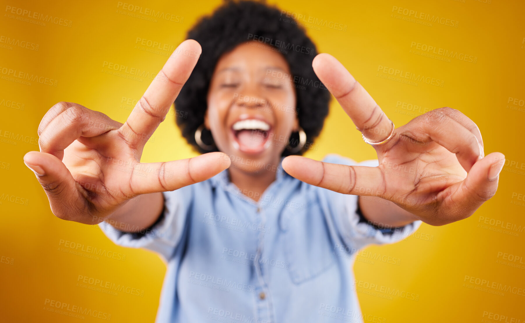 Buy stock photo Happy, excited and black woman with a peace sign in studio with positive and goofy mindset. Happiness, smile and African female model with an afro posing with a v hand gesture by yellow background.